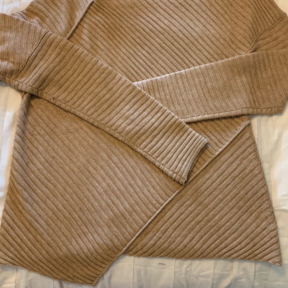 Light asymmetrical sweater